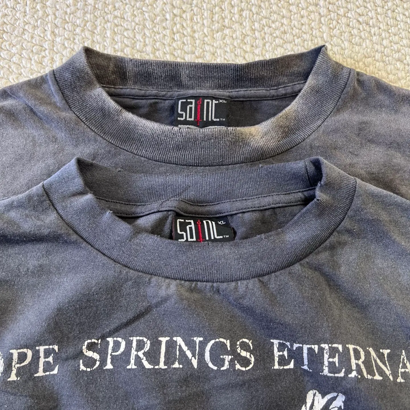 Pattern comparison SAINT Mxxxxxx SS TEE/HOPE SPRING/BLK Jesus slogan retro distressed TEE Washed in black S-XL Same as the original version Cylindrical side seam OE yarn fabric Garment dyeing Faded by heavy washing Bust plaster faded Correct pattern matching Original consistent accessories Original level printing restoration